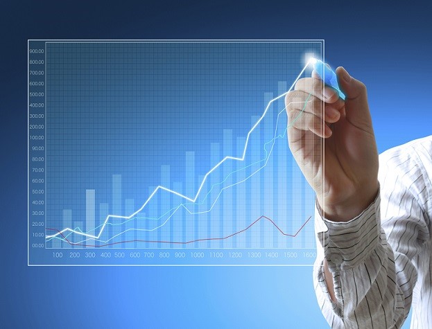 Business man hand drawing a graph